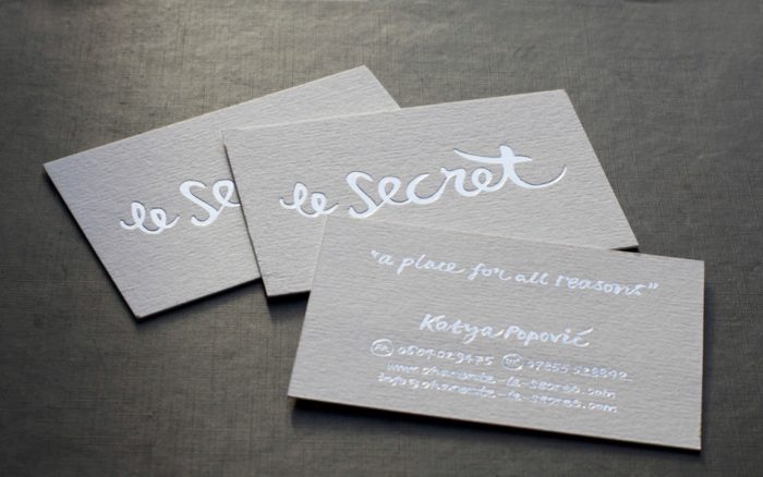 An example of silver foil embossing upon hand-made paper