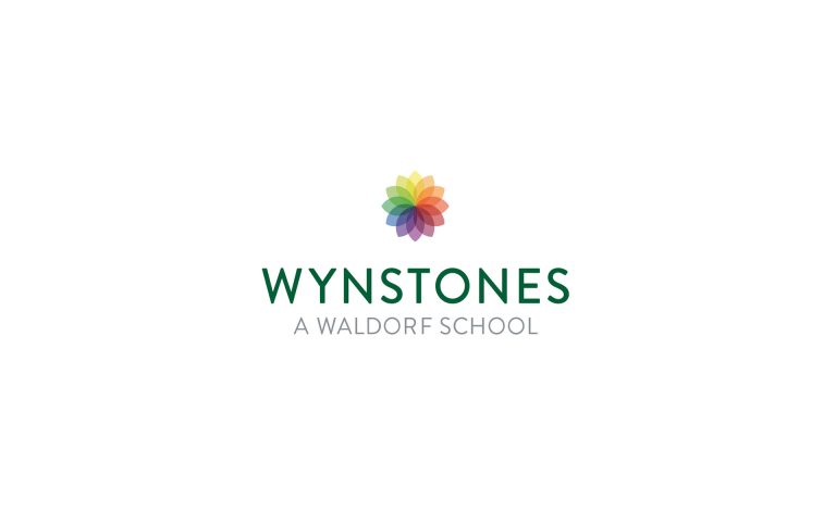 School logo Using the colour-roundal device echoing the use of Goethe's Colour Theory