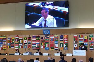 Carey Marks from Scarlet Design giving a presentation at the UN-FAO in Rome in 2019 showing how creative professionals can help researchers gain impact.